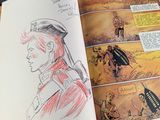 a drawing of a woman in a military uniform in a comic book