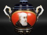 an image of a vase with a picture of a man on it