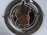 a picture of a picture of a woman in a dress in a circular window