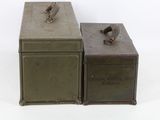 pair of army green metal boxes with handles and latches