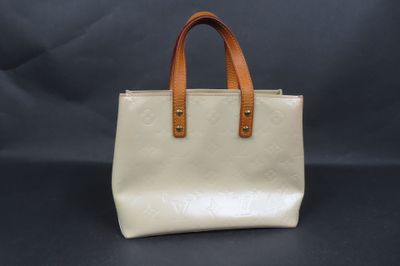 Sac cabas Louis Vuitton en cuir beige à motif Monogramme