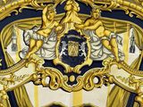 a picture of a gold and blue chair with a clock on it