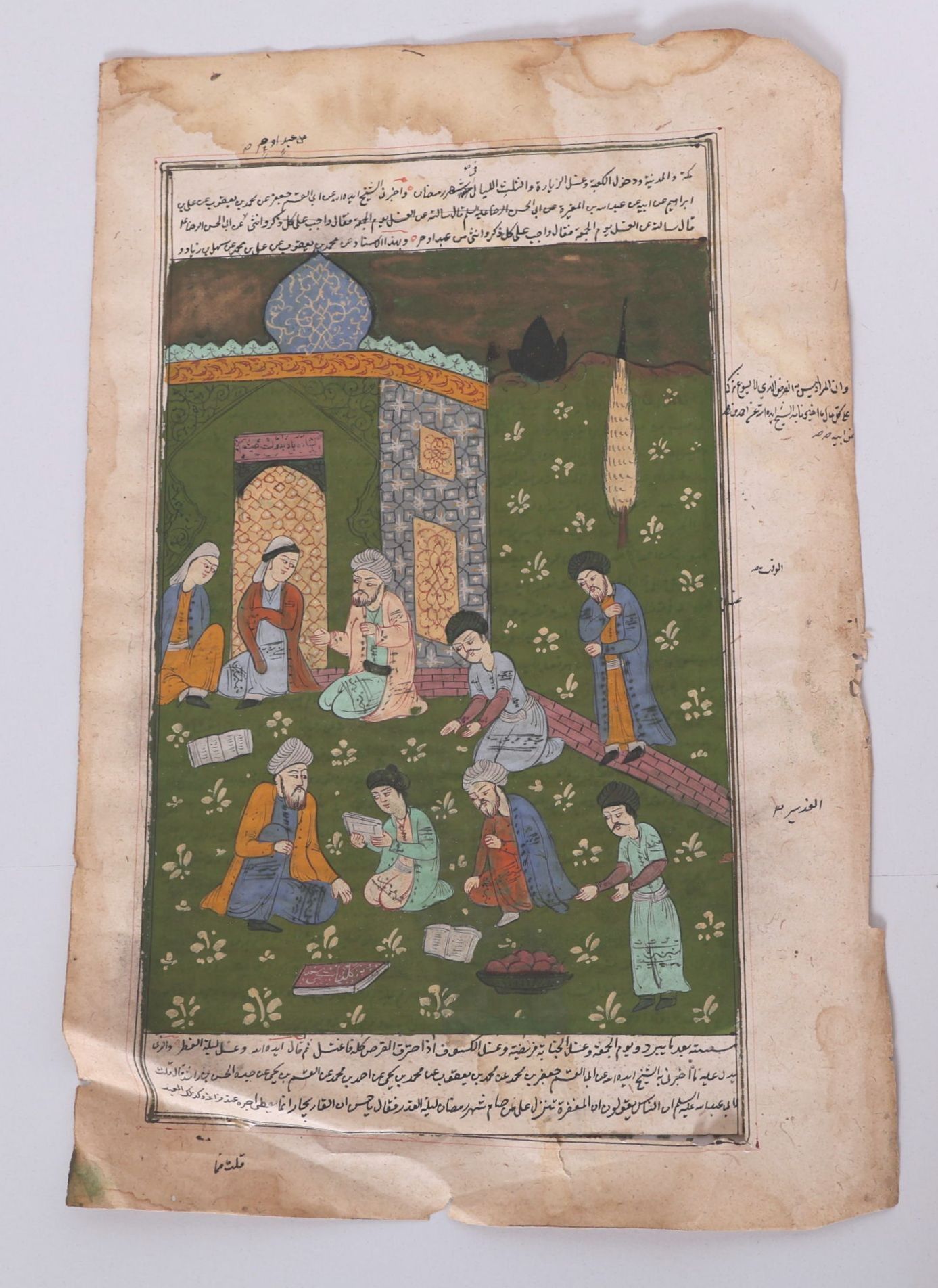IRAN, XXème siècle. Page manuscrite avec calligraphie persane et miniature à décor de scène de lecture et débats entr...
