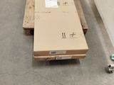 a large box sitting on top of a pallet in a warehouse