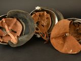 three helmets that are sitting next to each other