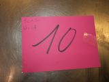 a pink note with the number 10 written on it