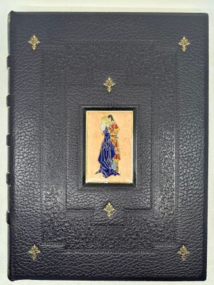 un vieux livre avec l'image d'une femme en robe bleue