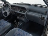 dashboard of a car with blue seats and dashboard controls