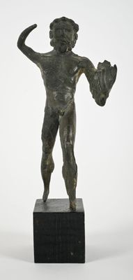 bronze statue of a boy holding a baseball glove and a ball