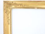 an old picture frame with a gold leaf pattern on it