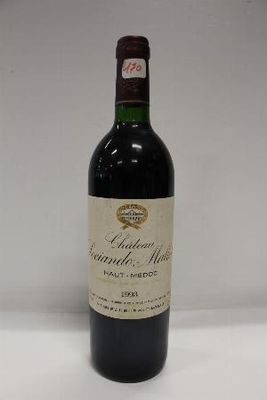 a bottle of wine that is sitting on a table