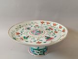 a white plate with a floral design on it
