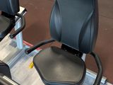 two chairs that are sitting on the floor in the gym