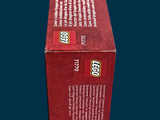 a box of toothpaste sitting on a blue surface