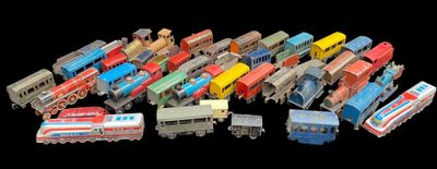 many different types of toy trains on a black background