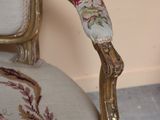 a chair that has a floral design on it