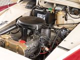 a small engine in the back of a red car