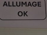 a sign that says allumage ok on it