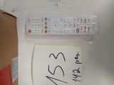 a remote control and a sign on the wall