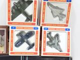 a lot of miniature planes that are in the boxes