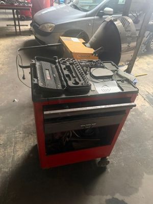 an image of a workbench with a lot of electronics on it