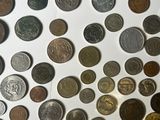 a lot of coins that are on the table