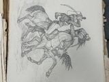 a drawing of a man riding a horse on a book