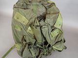 a large backpack with a bunch of tags on it