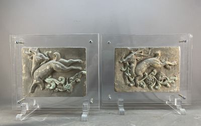 pair of marble reliefs of animals and flowers on acrylic bases