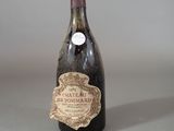 a bottle of wine that is sitting on a table
