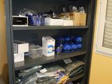 many boxes and boxes on the shelves in the room