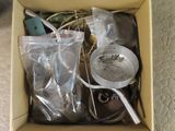 a box full of assorted items sitting on the floor