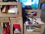 two cardboard boxes stacked on top of each other on the floor