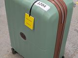 a suitcase with a tag on it sitting on the ground