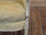a chair that is sitting on a hard wood floor
