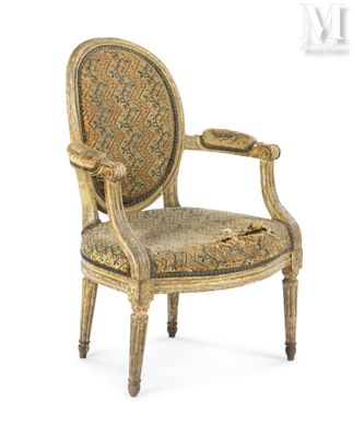 an image of a chair with a floral upholstered back and arms