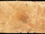 an image of a piece of stone that has been placed on a black surface