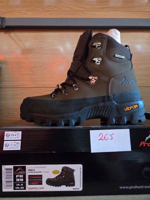 a pair of hiking boots on display in a store