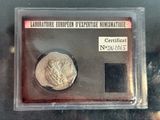 a picture of a coin in a plastic case