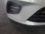 a close up view of a car ' s front bumper