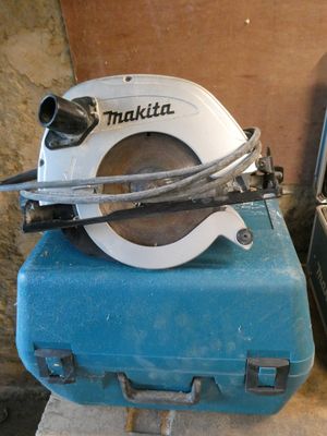 une photo d'une machine posée sur une valise