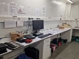 a room with a lot of desks and computers on it