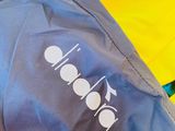 a close up of a jacket with a logo on it