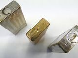 three different types of locks on a white surface