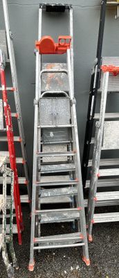 many ladders that are sitting next to each other