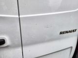 a close up of a car door handle with the word renault written on it
