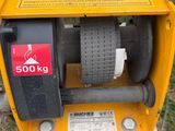 a close up of a machine that is sitting on the ground