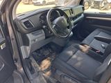 the interior of a car with a steering wheel and dashboard