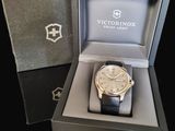 a watch that is in a box on a table