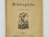 an old book with a picture of a dog on it